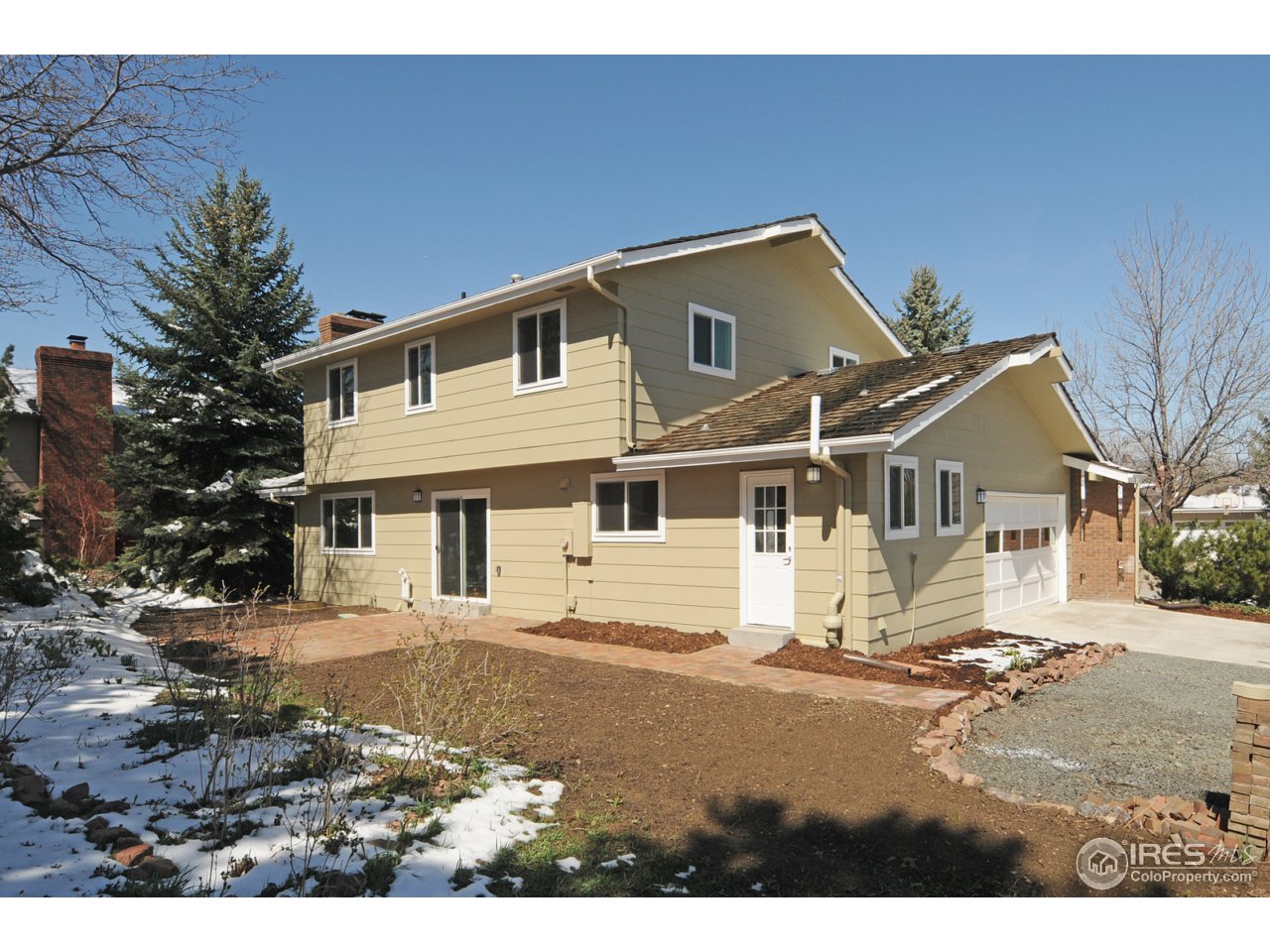7428 Mt Sherman Road Longmont, CO 80503 - Photo 2 of 25 Back home with brick patio