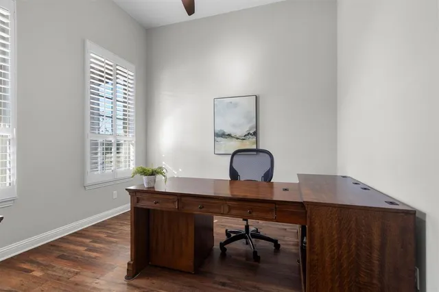 a workspace with wooden floor