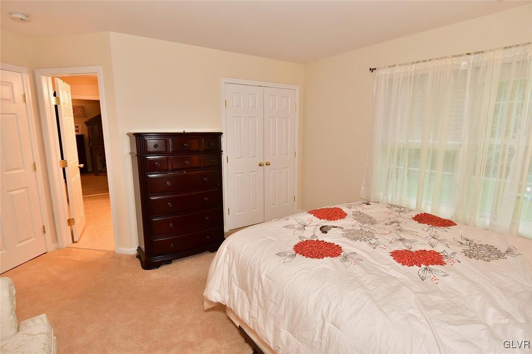 820 Texas Road Easton, PA 18042 - Photo 30 of 41 a bedroom with a bed and a dresser