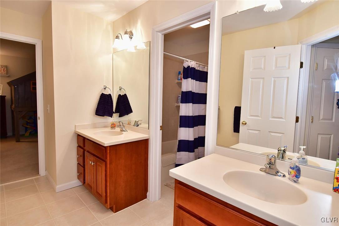 820 Texas Road Easton, PA 18042 - Photo 31 of 41 a bathroom with a sink and a mirror