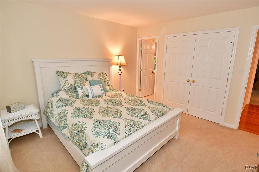 820 Texas Road Easton, PA 18042 - Photo 33 of 41 a bed sitting in a bedroom next to a cabinet
