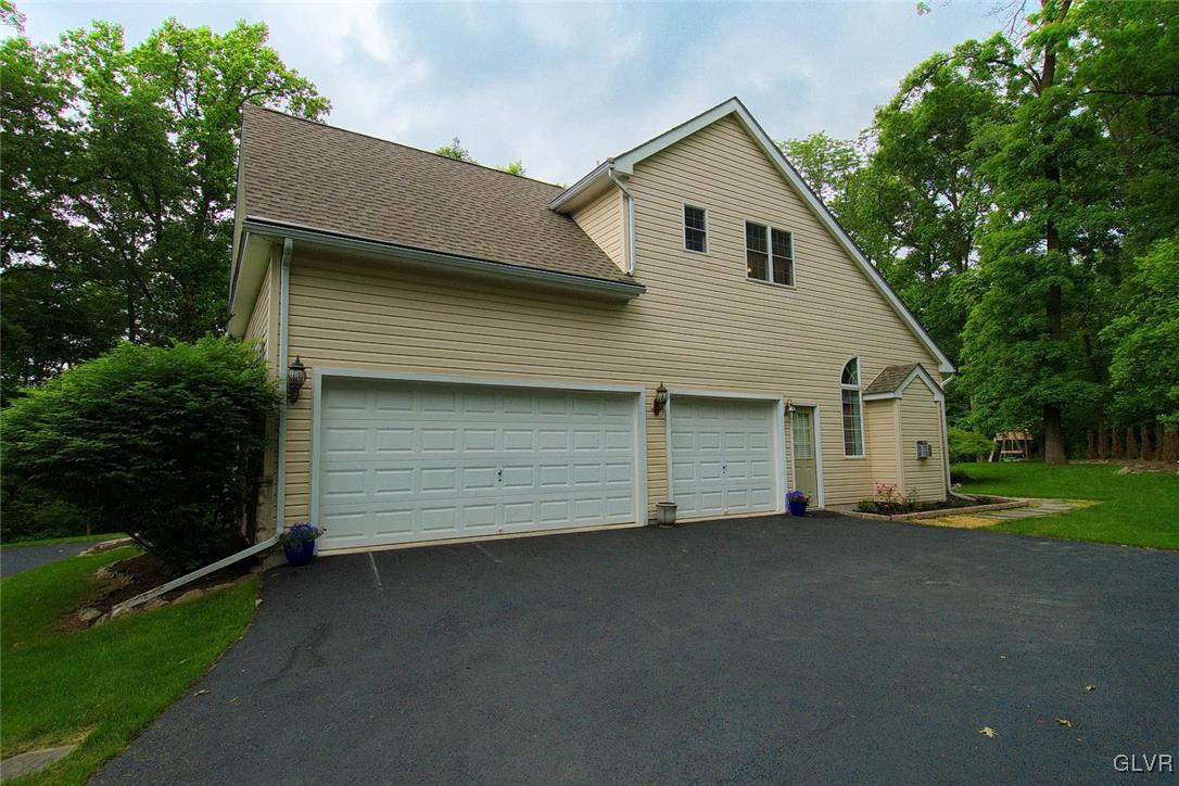 820 Texas Road Easton, PA 18042 - Photo 36 of 41 a view of a house with a yard and garage