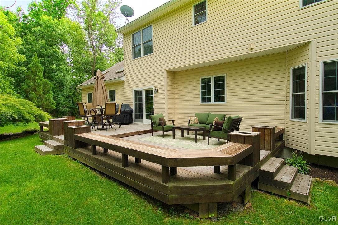 820 Texas Road Easton, PA 18042 - Photo 37 of 41 a view of a patio with chairs and table in a patio