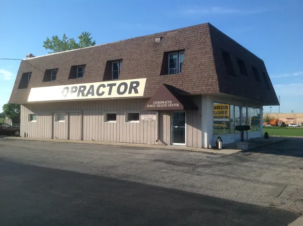 a front view of a house with garage