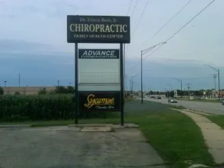a sign on the side of the road