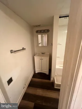 a view of a hallway with front door