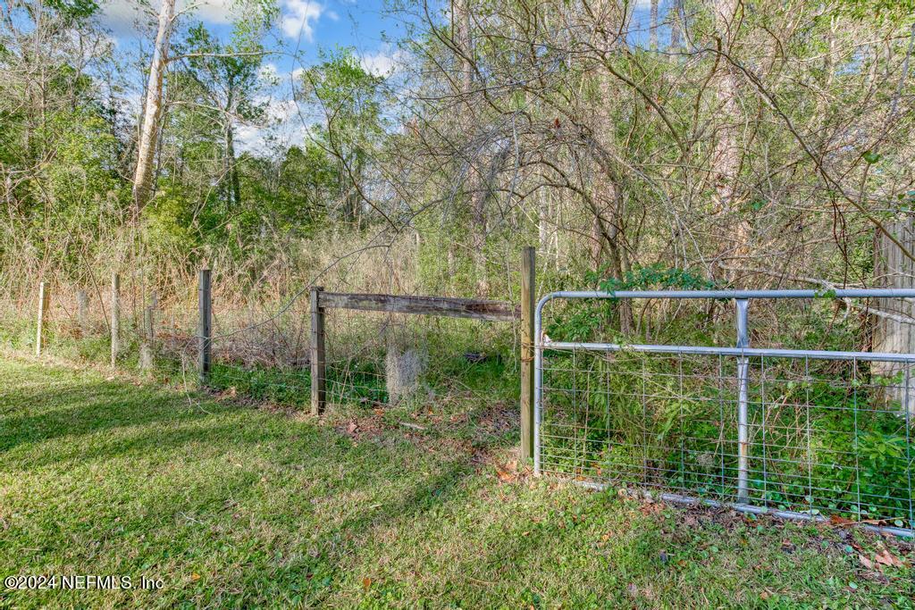 11258 Irma Road Jacksonville, FL 32218 - Photo 31 of 36 Rear fence