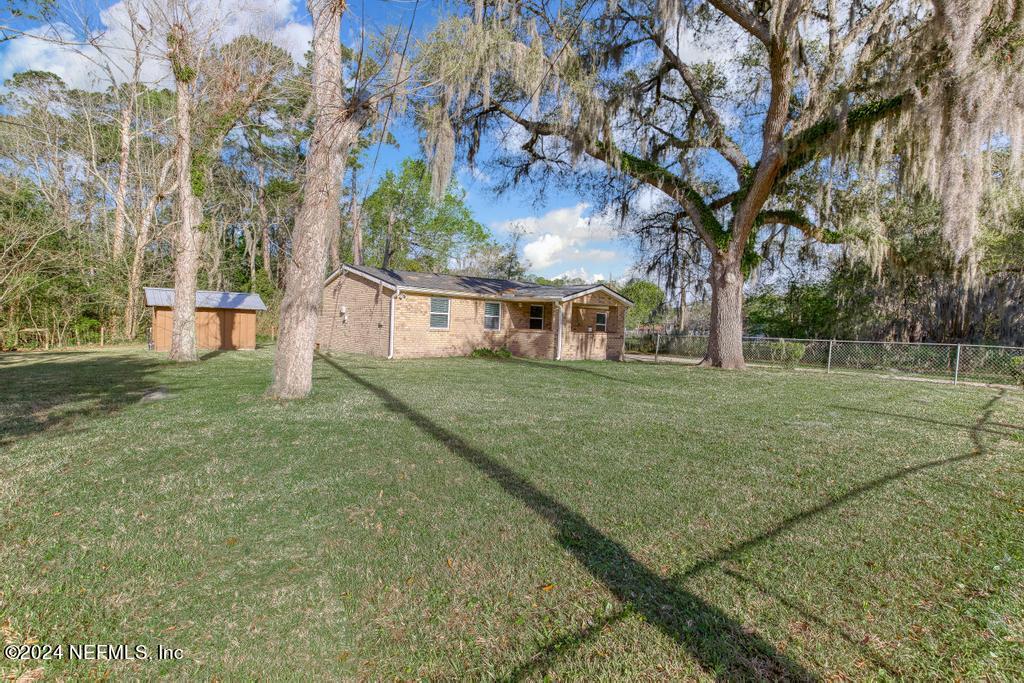 11258 Irma Road Jacksonville, FL 32218 - Photo 34 of 36 Left Side of home