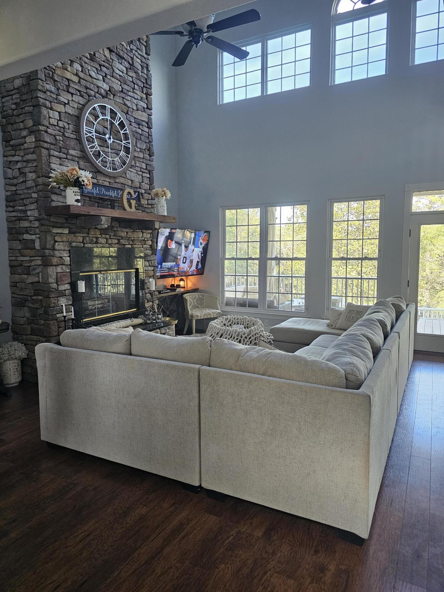 75 Evergreen Parkway DeFuniak Springs, FL 32435 - Photo 12 of 51 a living room with furniture and a fireplace