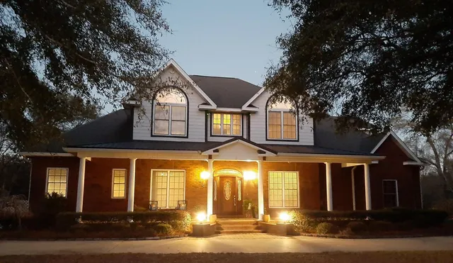 a view of backyard with tree