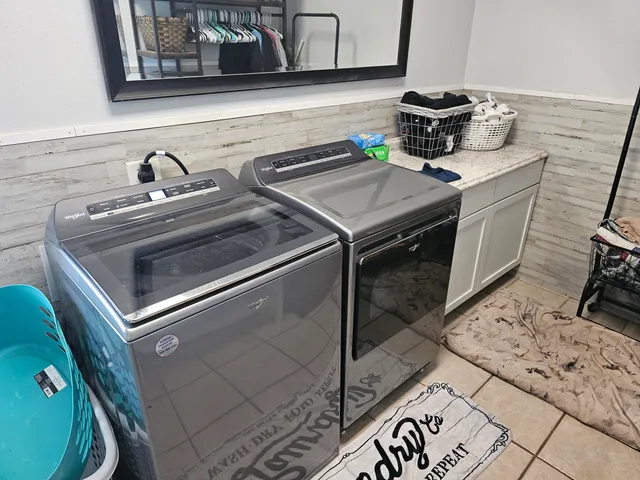 a view of a swimming pool with a yard