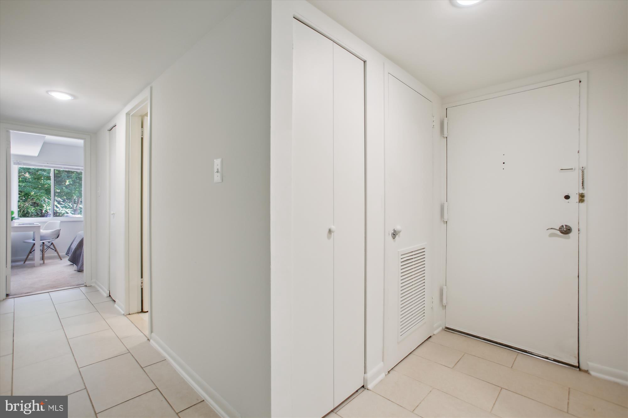 1408 Northgate Square, Unit 12B Reston, VA 20190 - Photo 14 of 31 View from Foyer to Hall