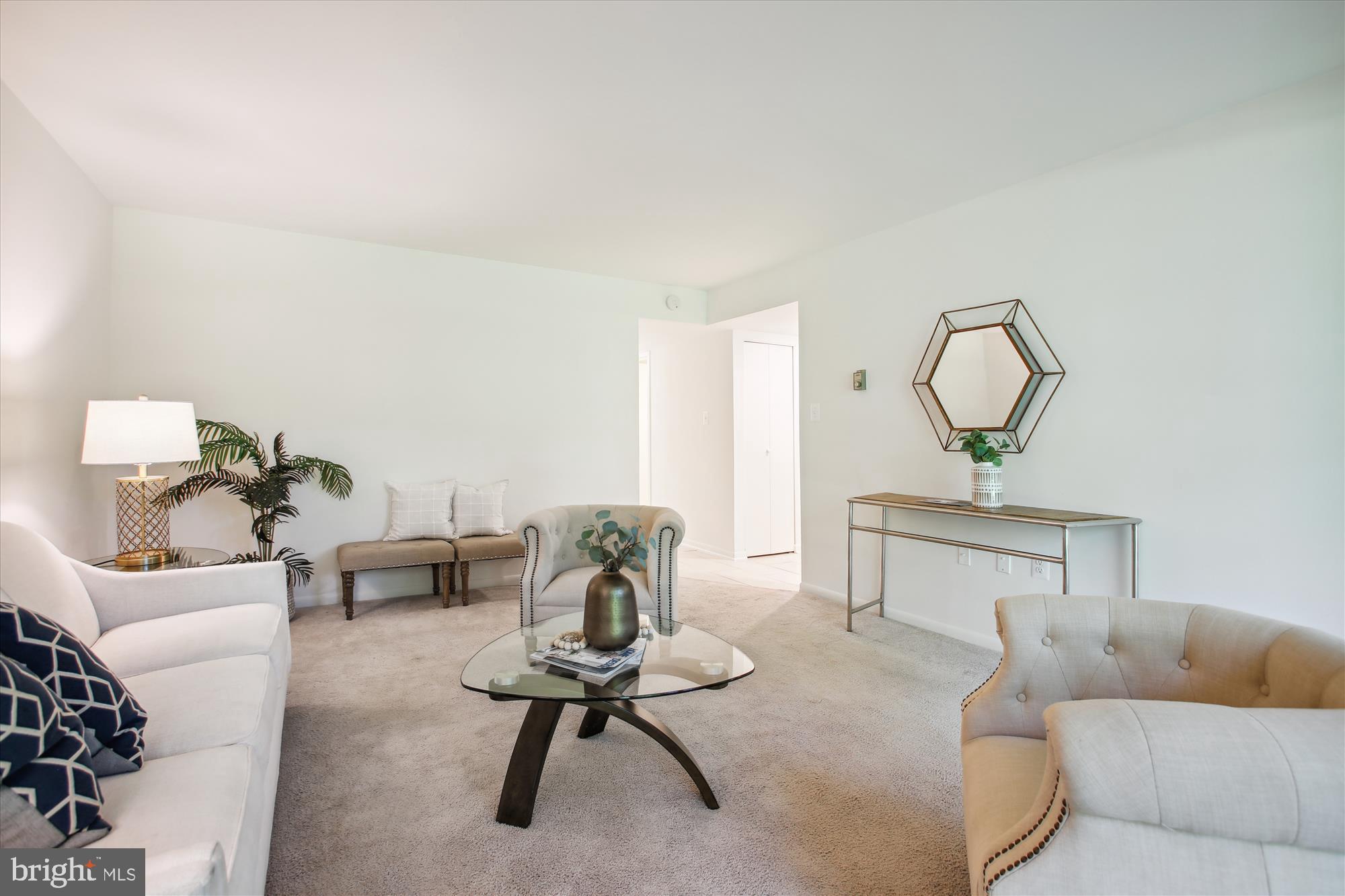 1408 Northgate Square, Unit 12B Reston, VA 20190 - Photo 5 of 31 View from Living Room to Entry and Hallway