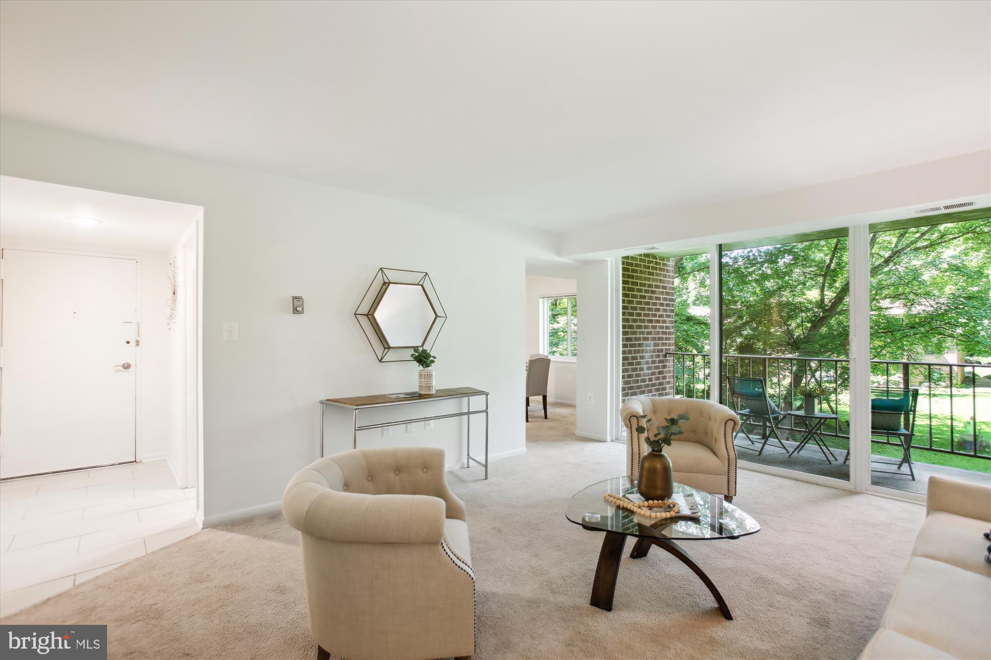 1408 Northgate Square, Unit 12B Reston, VA 20190 - Photo 6 of 31 View from Living Room to Entry and Dining Room.