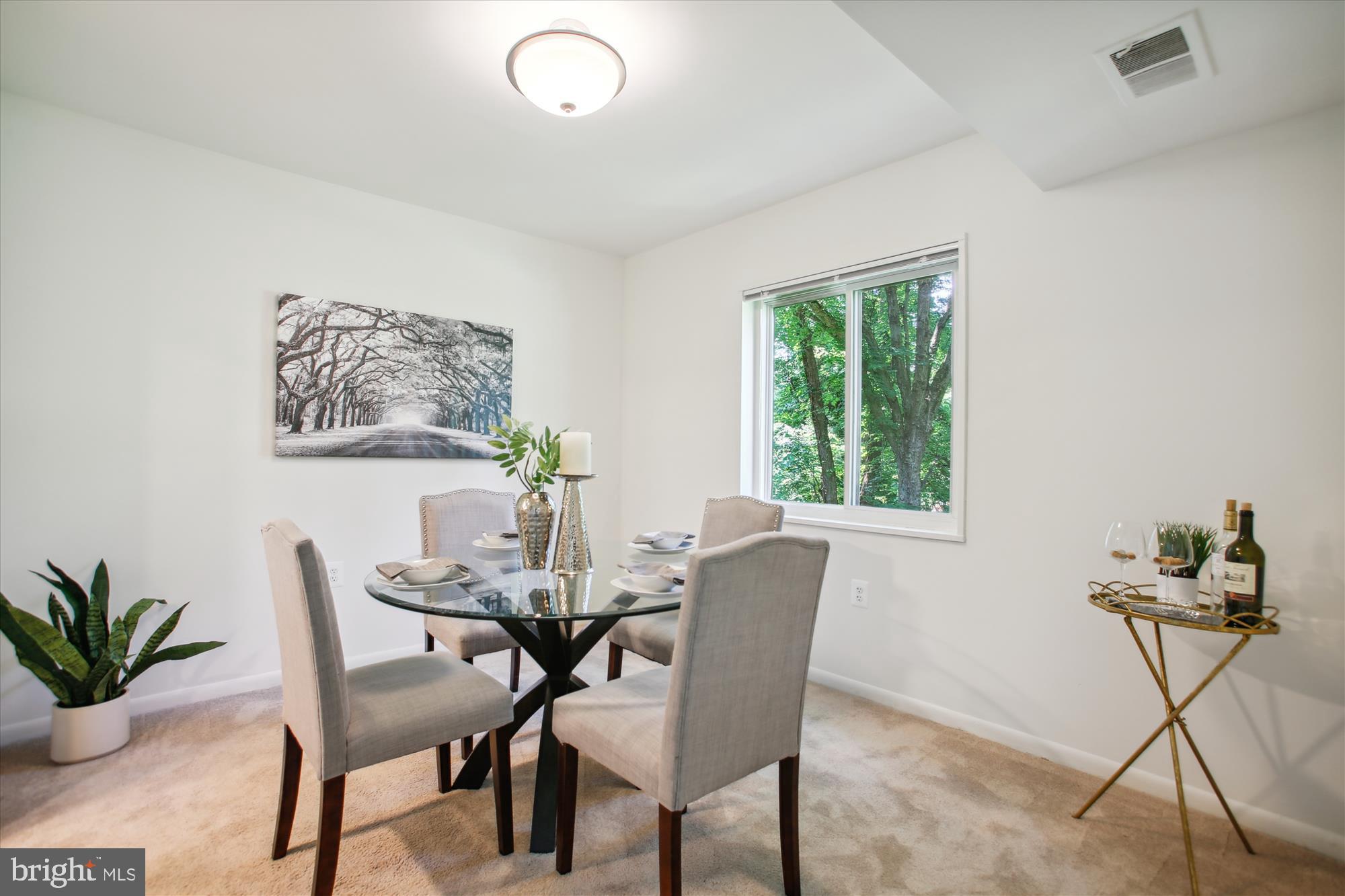 1408 Northgate Square, Unit 12B Reston, VA 20190 - Photo 8 of 31 View from Living Room to Formal Dining Room.