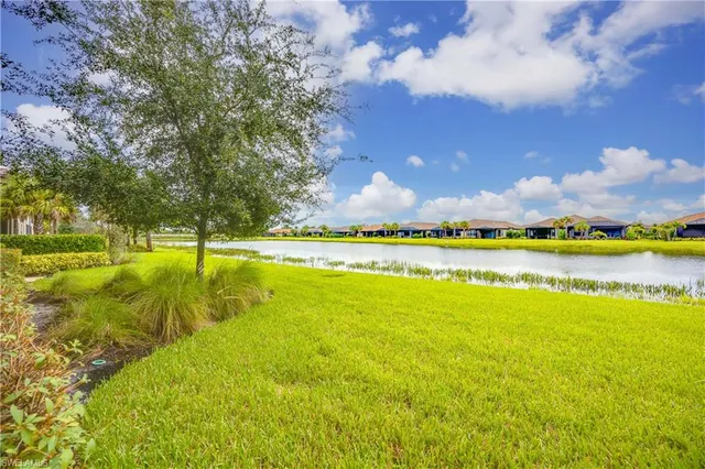 a view of an swimming pool and an outdoor seating