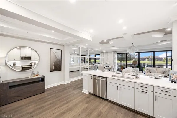 a kitchen with a sink and cabinets