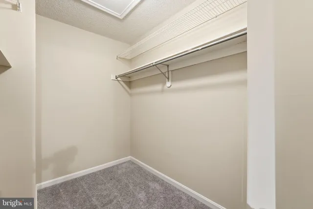 a view of a balcony with a table and chairs