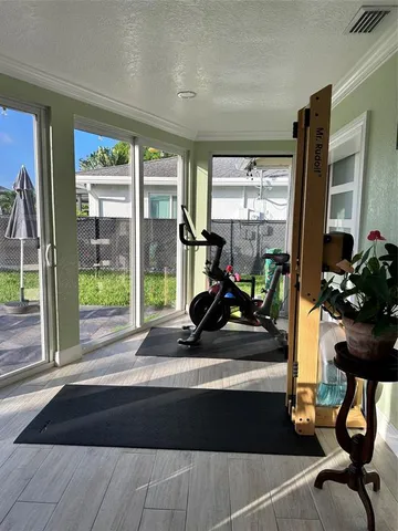 a view of a room with gym equipment