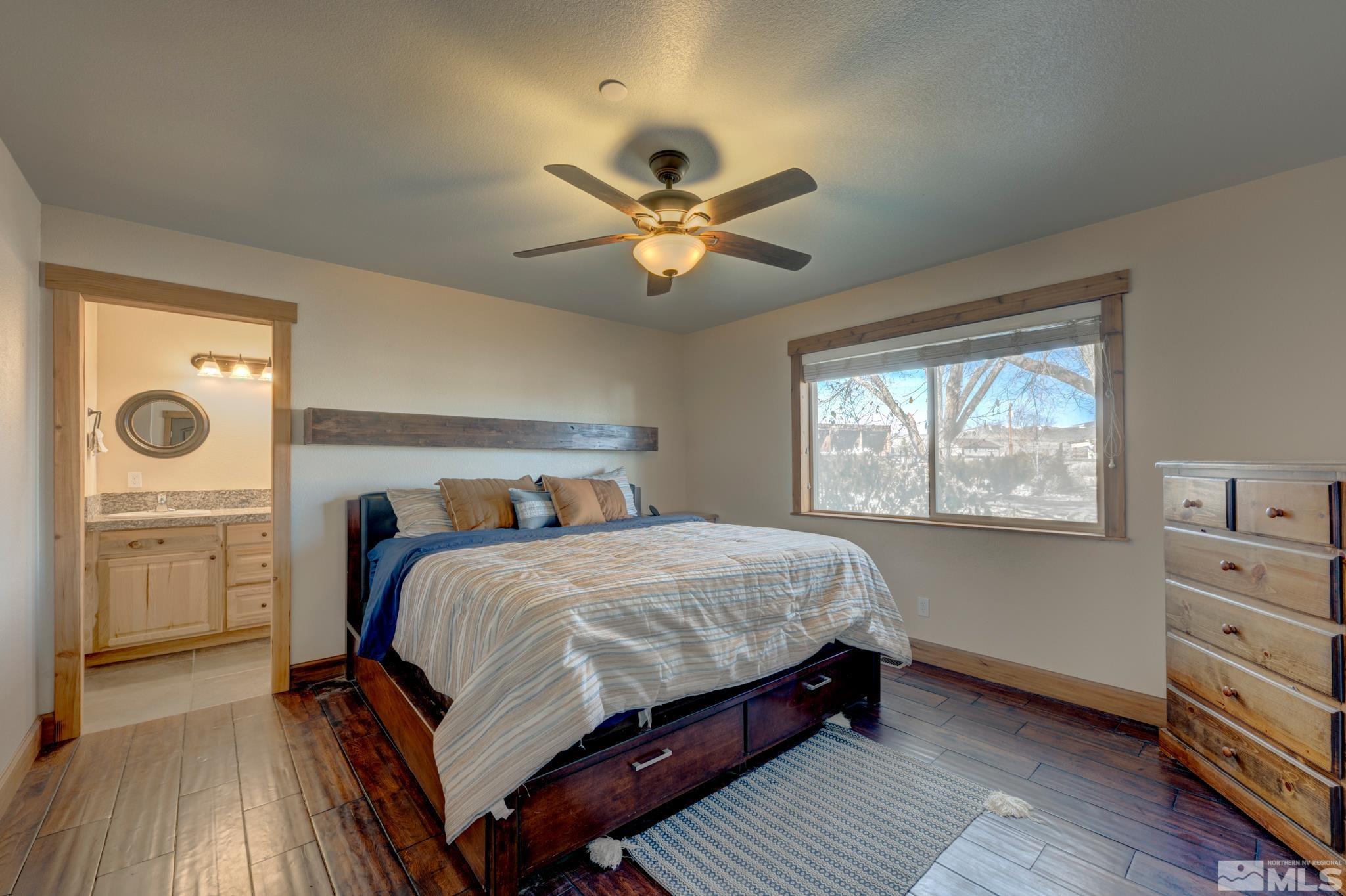10500 Wells Fargo Road Reno, NV 89508 - Photo 13 of 37 a bedroom with a bed and a window