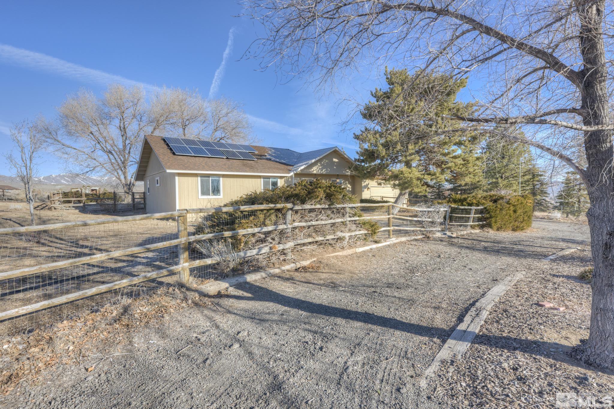 10500 Wells Fargo Road Reno, NV 89508 - Photo 2 of 37 a view of a yard with a house