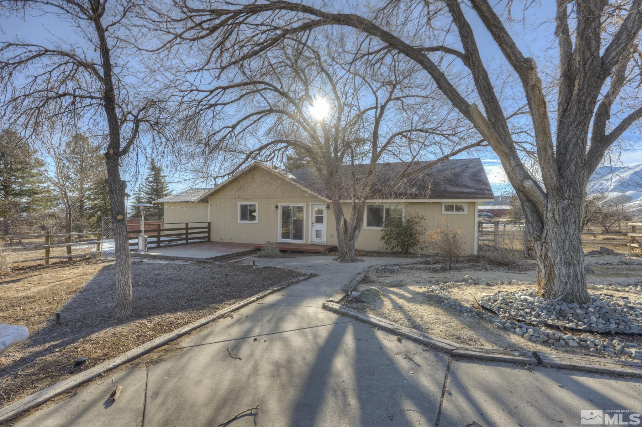 10500 Wells Fargo Road Reno, NV 89508 - Photo 24 of 37 a view of a house with snow on the road
