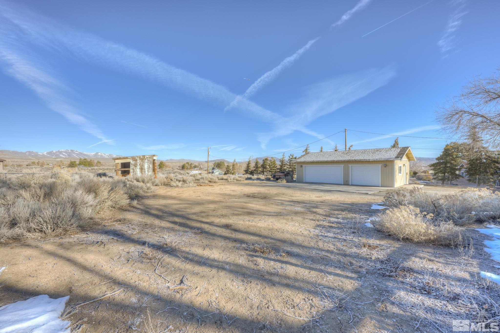 10500 Wells Fargo Road Reno, NV 89508 - Photo 27 of 37 a view of a dry yard with wooden fence