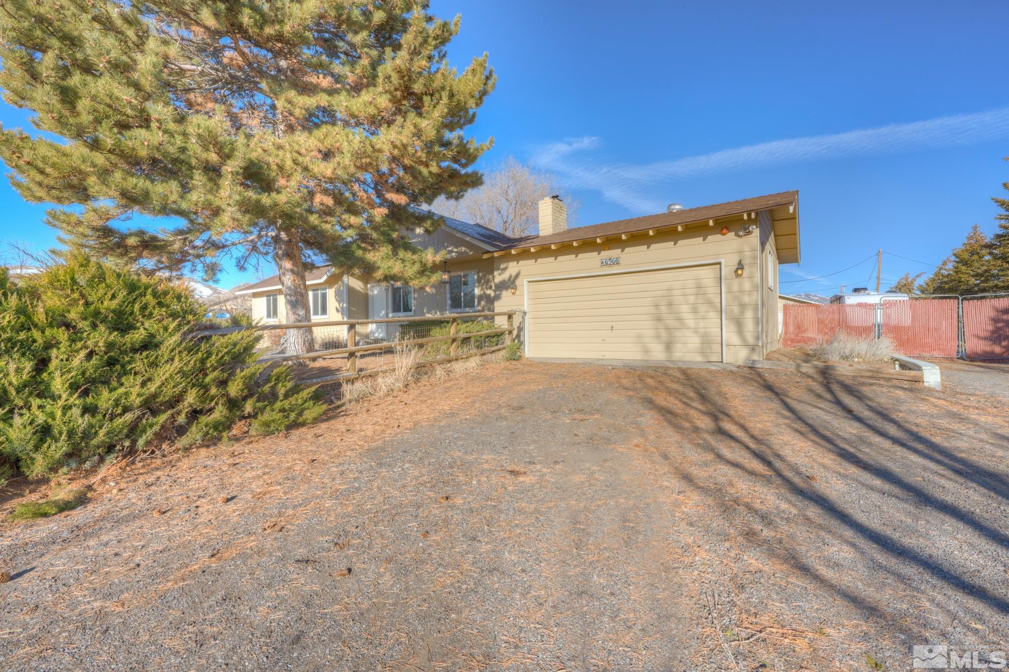 10500 Wells Fargo Road Reno, NV 89508 - Photo 4 of 37 a view of a house with a yard