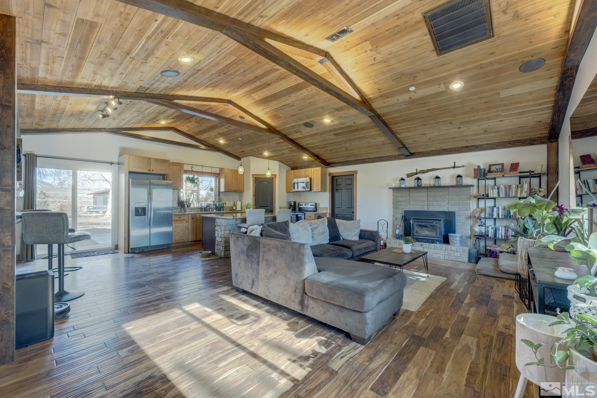 10500 Wells Fargo Road Reno, NV 89508 - Photo 5 of 37 a living room with furniture and a fireplace