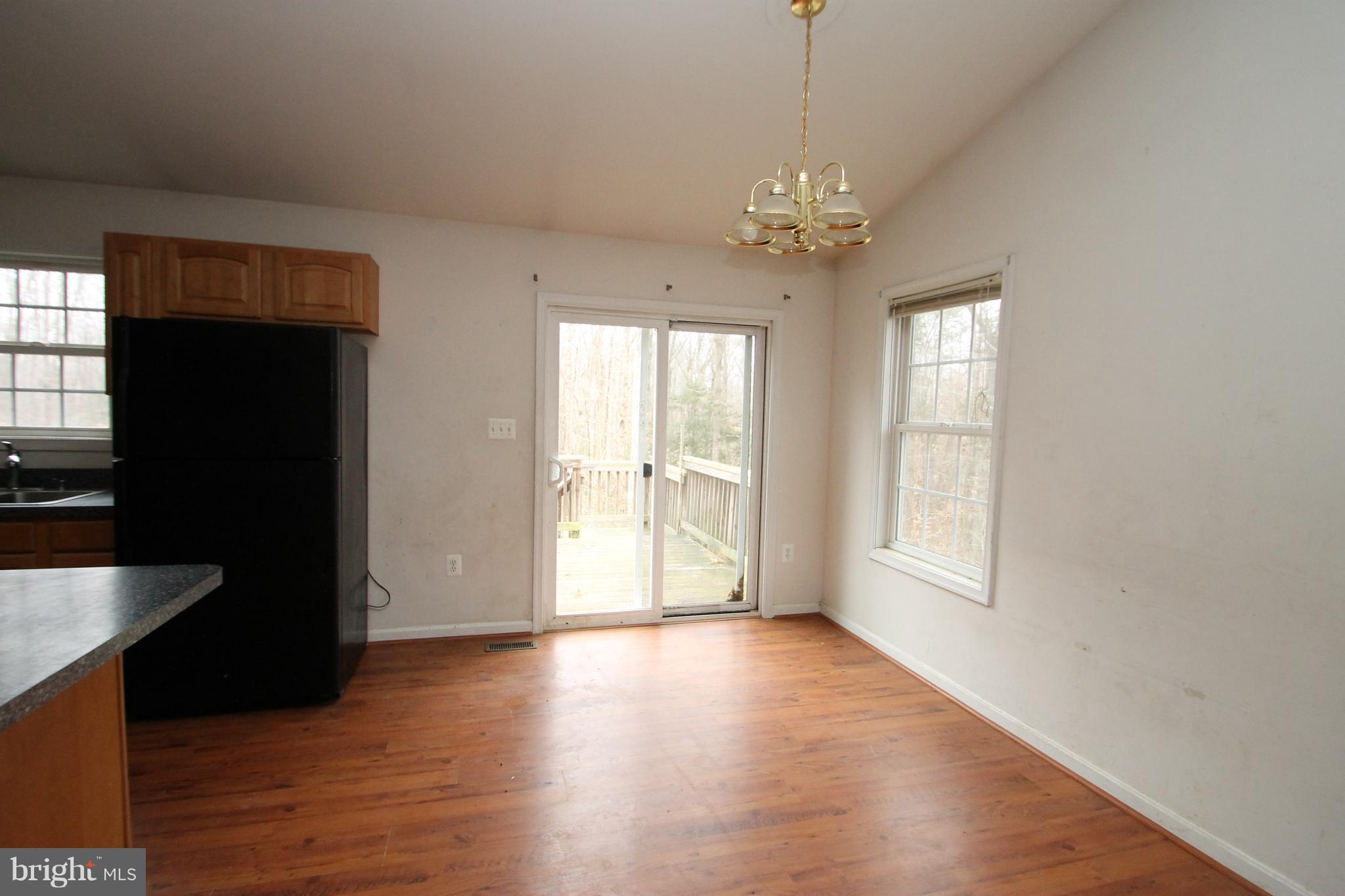 120 Lone Oak Road Partlow, VA 22534 - Photo 7 of 26 Vaulted Dining area with Deck access