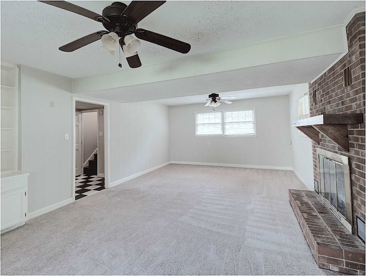 709 Barbara Drive Raleigh, NC 27606 - Photo 12 of 24 Lower Level Bonus Room w/ Fireplace