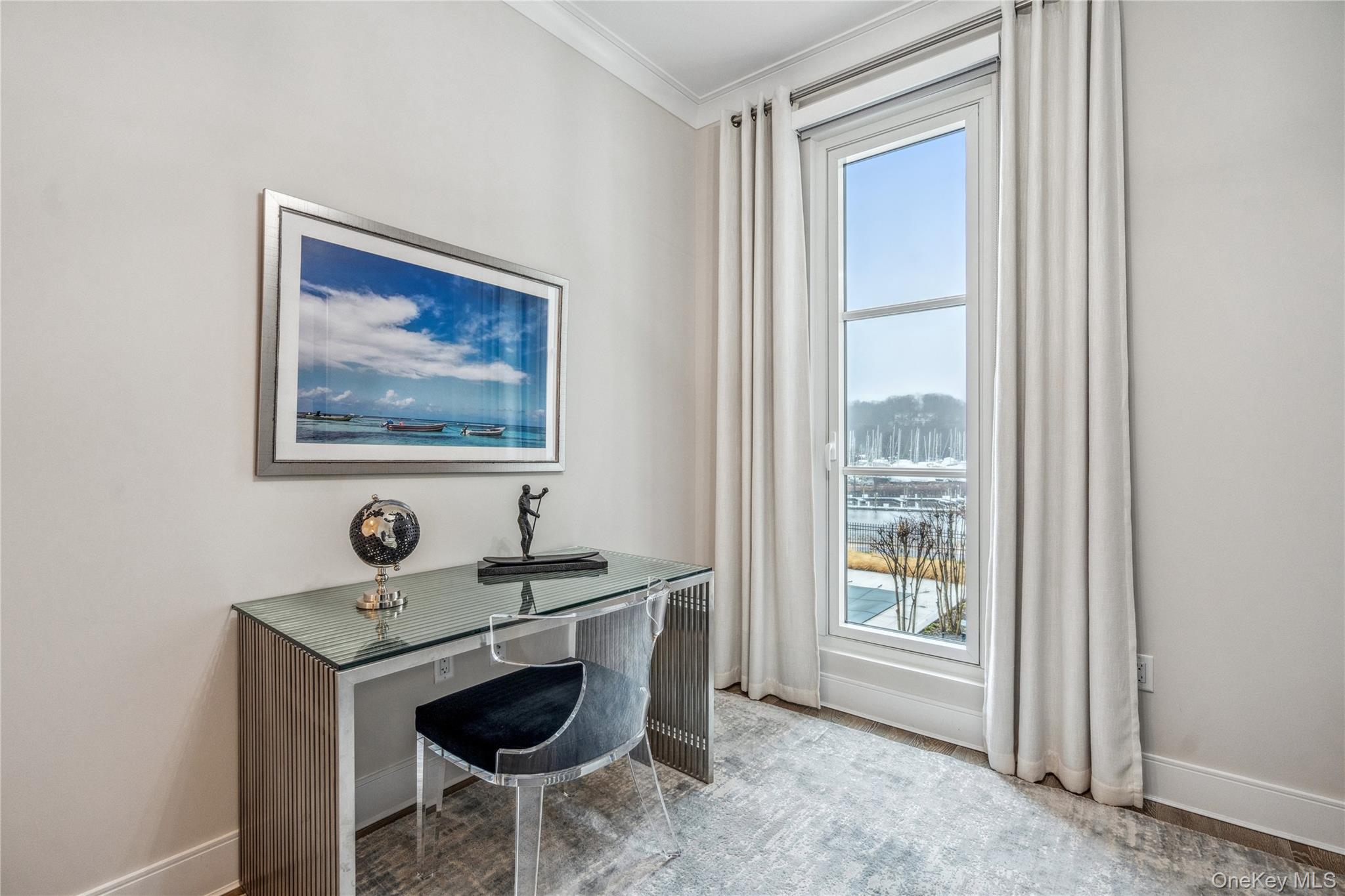 100 Garvies Point Road, Unit 1126 Glen Cove, NY 11542 - Photo 10 of 40 Office area with light hardwood / wood-style floors and ornamental molding