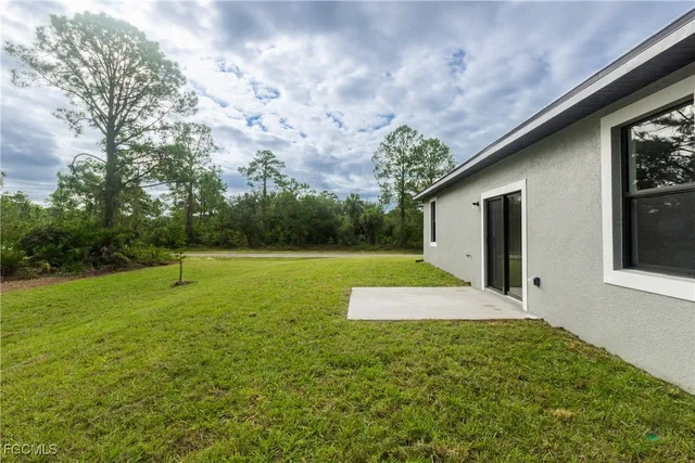 a view of a backyard with a garden