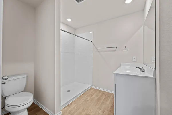 a utility room with cabinets washer and dryer