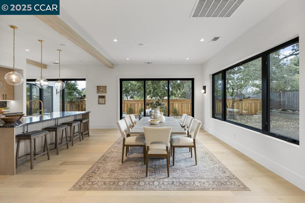 11 Willowmere Road Danville, CA 94526 - Photo 13 of 58 a dining room with wooden floor and large windows