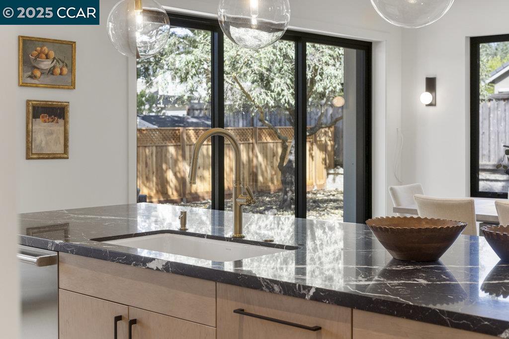 11 Willowmere Road Danville, CA 94526 - Photo 17 of 58 a living room with a granite countertop sink and garden view
