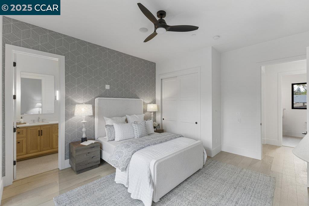 11 Willowmere Road Danville, CA 94526 - Photo 23 of 58 a bedroom with a bed and a mirror