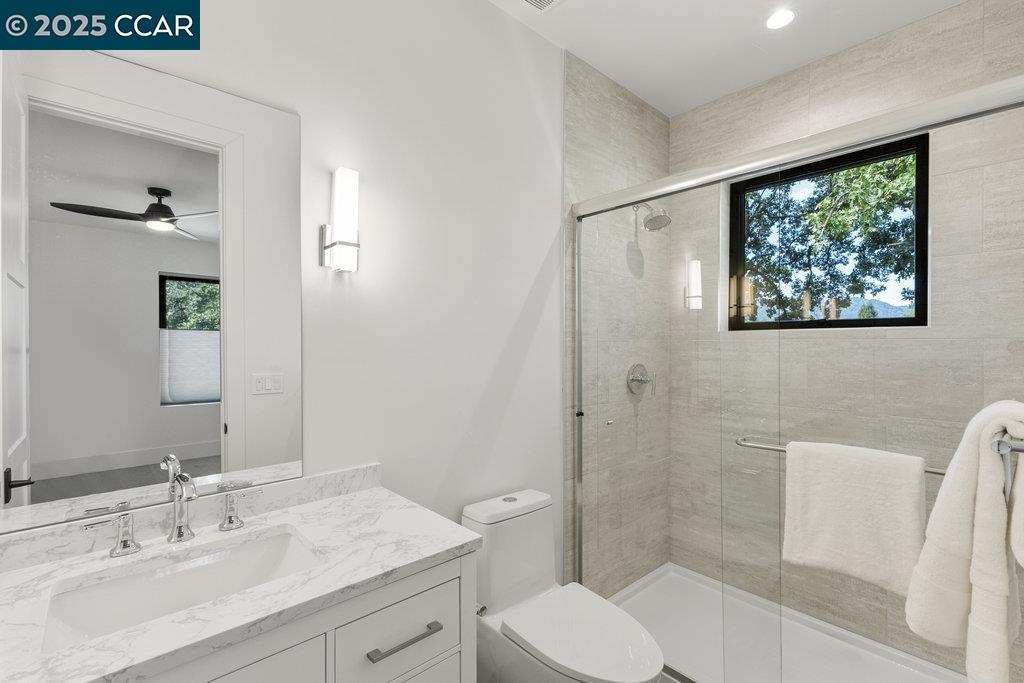11 Willowmere Road Danville, CA 94526 - Photo 25 of 58 a bathroom with a sink a toilet and shower