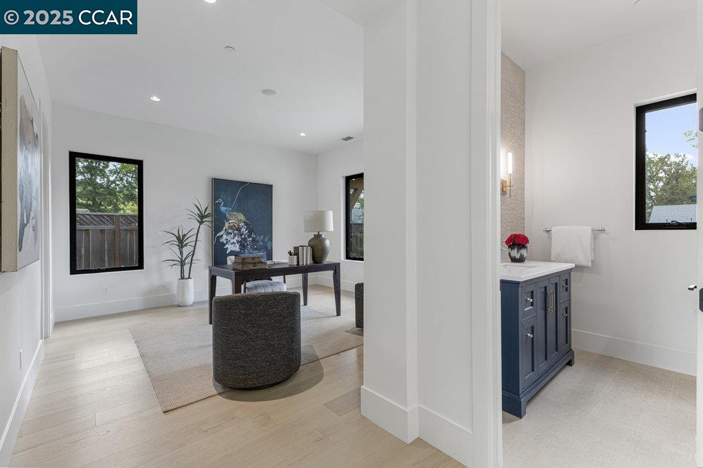 11 Willowmere Road Danville, CA 94526 - Photo 26 of 58 a living room with furniture a flat screen tv and a window