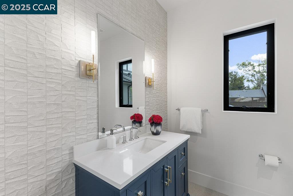 11 Willowmere Road Danville, CA 94526 - Photo 29 of 58 a bathroom with a sink and a mirror