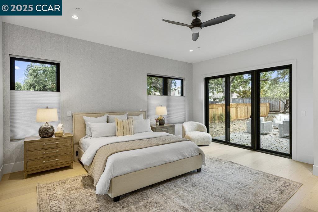 11 Willowmere Road Danville, CA 94526 - Photo 31 of 58 a bedroom with a large bed and a window