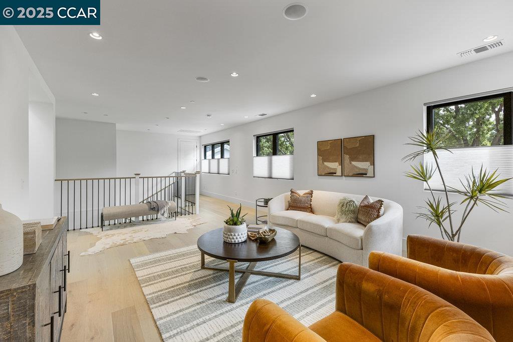 11 Willowmere Road Danville, CA 94526 - Photo 39 of 58 a living room with furniture and a wooden floor