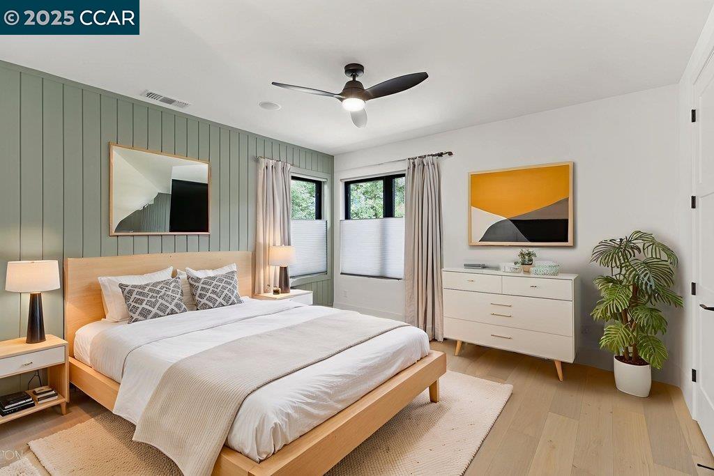 11 Willowmere Road Danville, CA 94526 - Photo 42 of 58 a bedroom with a bed and a flat screen tv