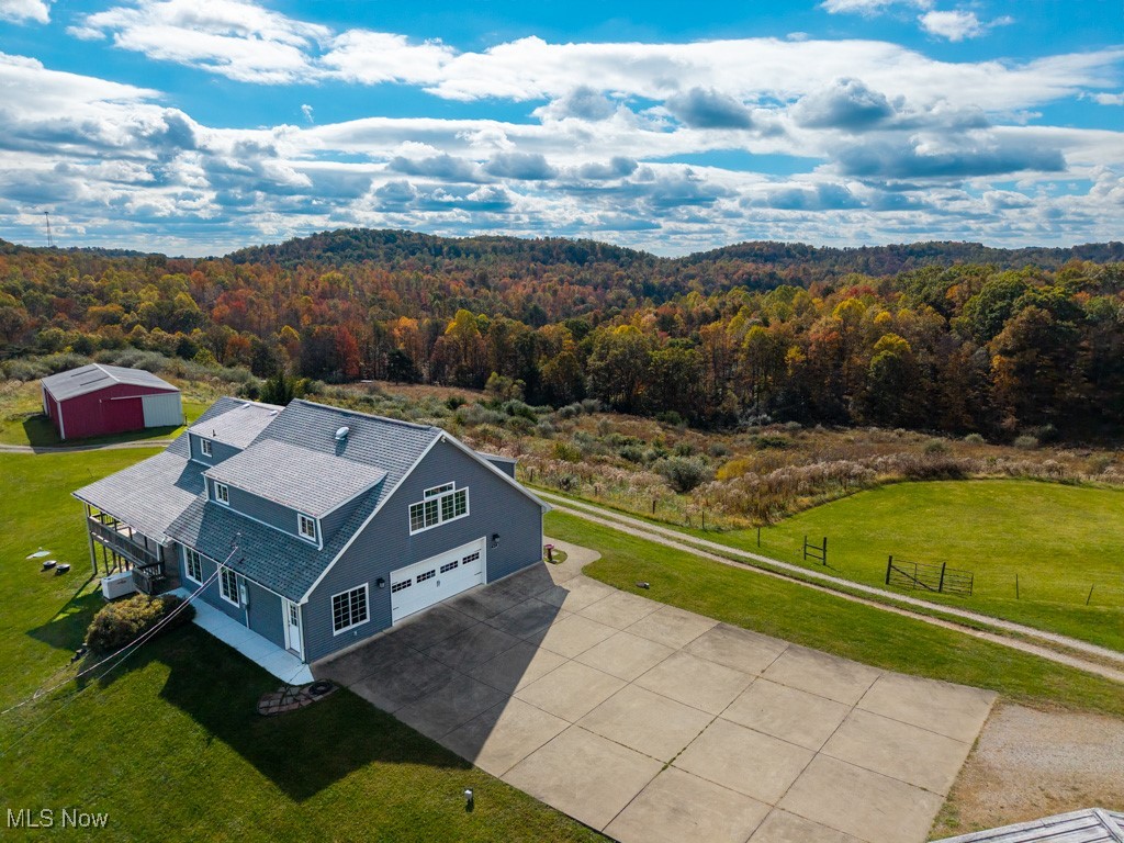 913 Rost Road Walker, WV 26180 - Photo 42 of 48 Overview of rural landscape featuring a heavily wooded area