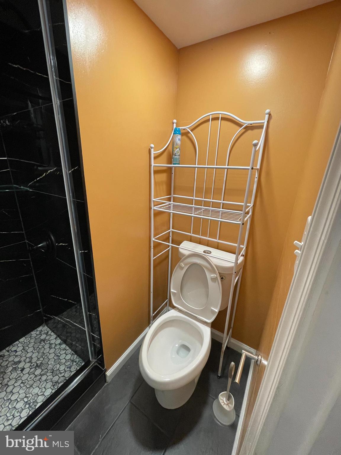 106 Marley Station Road Glen Burnie, MD 21060 - Photo 13 of 36 a bathroom with a toilet and a shower