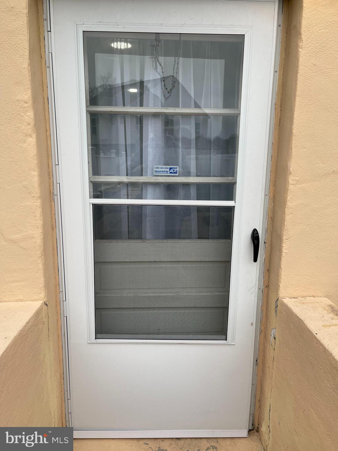 106 Marley Station Road Glen Burnie, MD 21060 - Photo 2 of 36 a view of wooden door