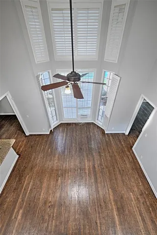 a view of front door with wooden floor