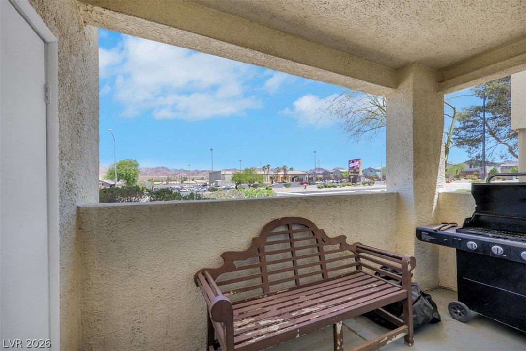 698 South Racetrack Road, Unit 1614 Henderson, NV 89015 - Photo 33 of 35 A breezy outdoor patio provides scenic mountain and city views.