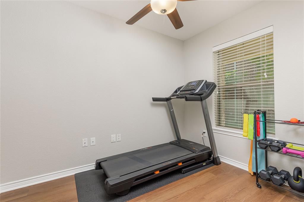 2104 Azure Pointe Richardson, TX 75080 - Photo 24 of 28 a room with gym equipment