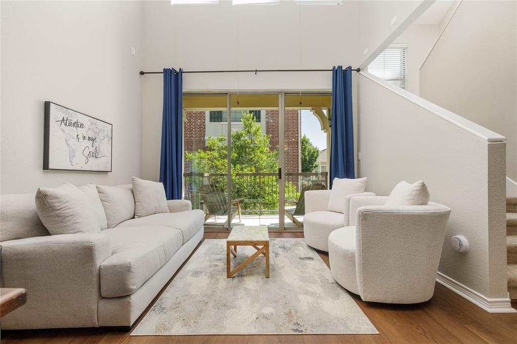 2104 Azure Pointe Richardson, TX 75080 - Photo 3 of 28 a living room with furniture and a large window